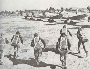Pilots of the Chinese Flying Tigers are running to their planes.