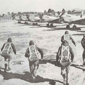 Pilots of the Chinese Flying Tigers are running to their planes.