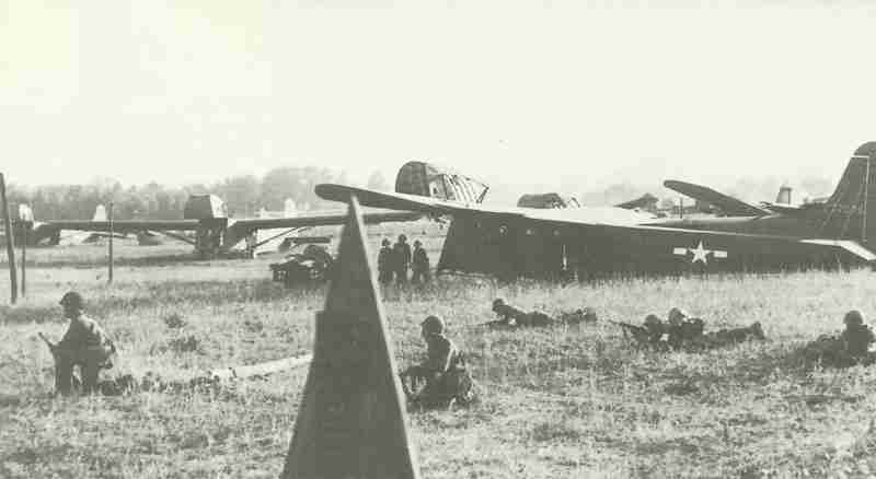 Airborne troops alongside their Waco CG-4A gliders