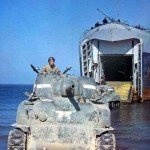 Shermans leaving a landing ship.