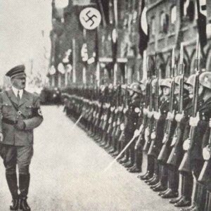 Himmler and Hitler walking in front of a SS honour guard company.