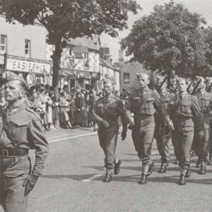 Polish troops march through an English town during the summer of 1940