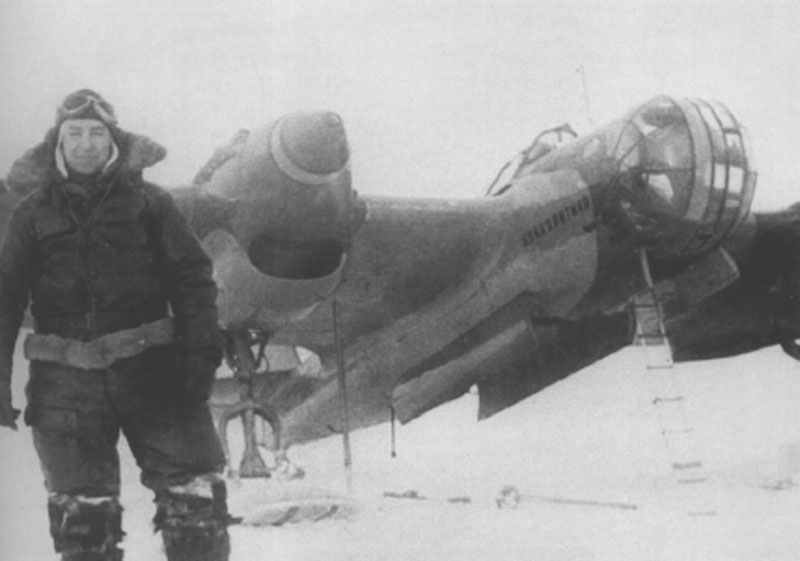 Russian pilot in front of his Tupolev SB-2 bomber.