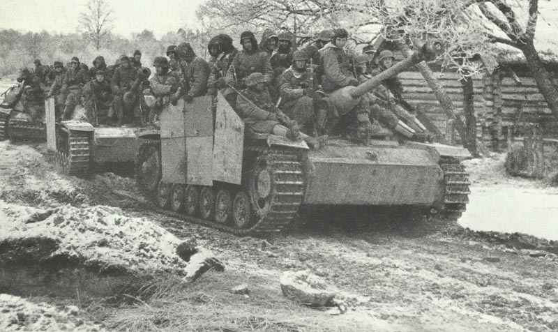 StuG III with mounted infantry