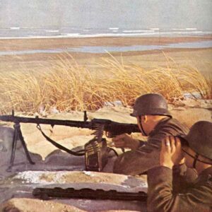 Two German soldiers with their MG34 man a defensive post on the Channel coast