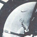 gunner of bomber fires on Spitfire