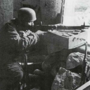 German paratrooper armed with the early 'E-Type' FG42 assault rifle