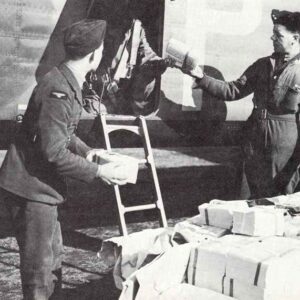 loading leaflets in a RAF bomber.