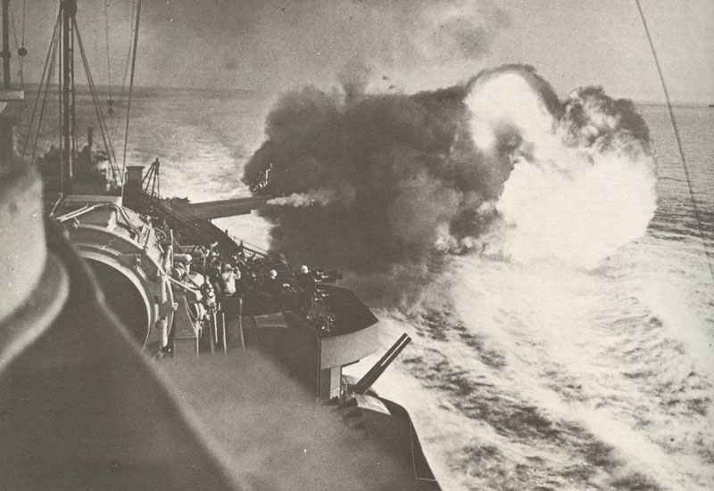 Warspite is bombarding a land target
