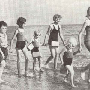 Evacuated British school-children at a beach.