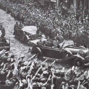 Hitler returns to Berlin in triumph