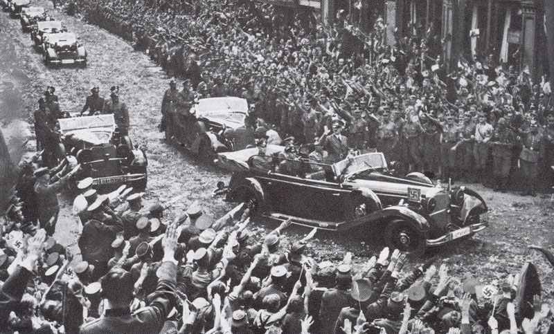 Hitler returns to Berlin in triumph