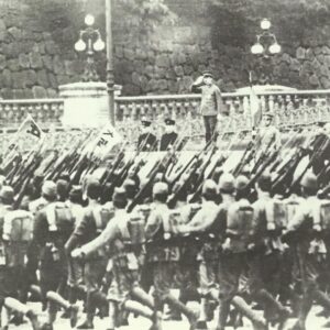 Emperor Hirohito reviews parade