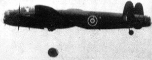 Upkeen (Dambuster) mine drops away from a Lancaster bomber