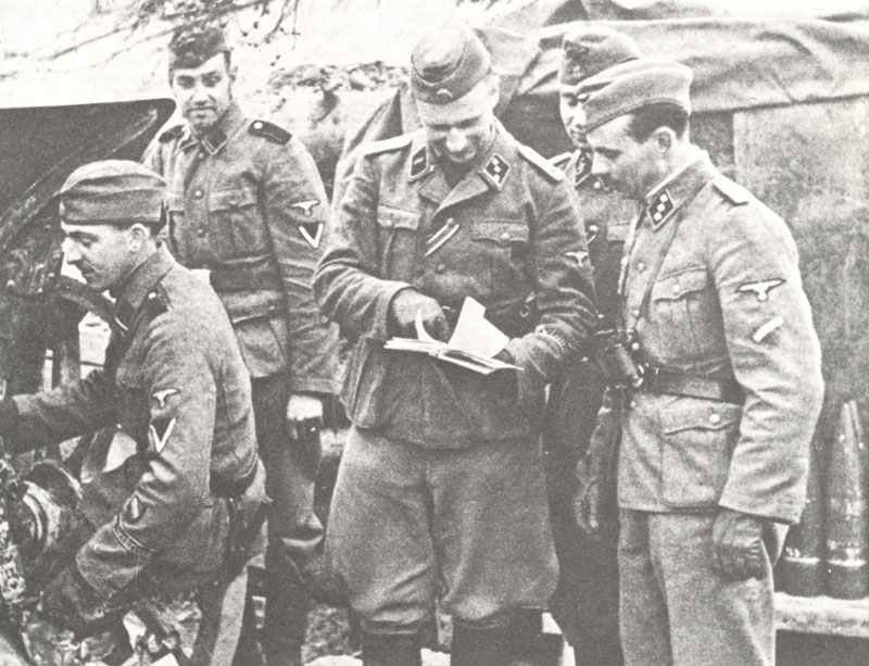 3 Dutch SS soldiers with two Latvians