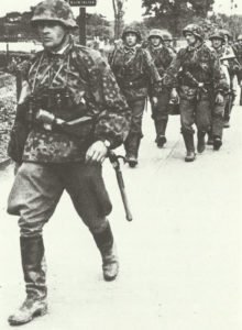 Junior officer followed by soldiers of LAH