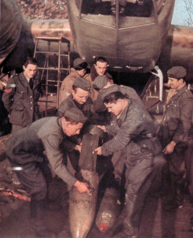 Italian ground crew is loading a bomber