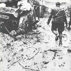 Greek soldiers in the autumn rain and deep mud