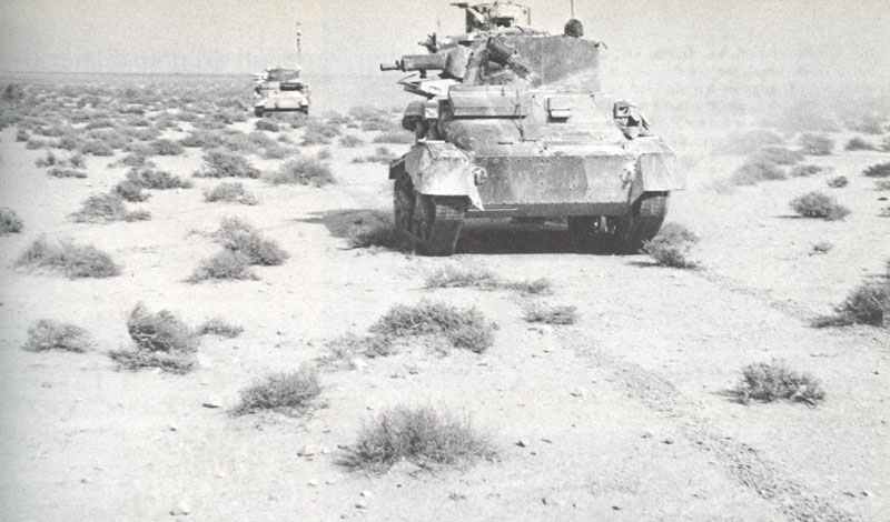 British tanks moving across the desert.