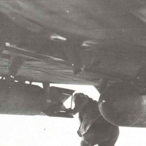 Loading SC-250 bombs on the external racks of an He 111