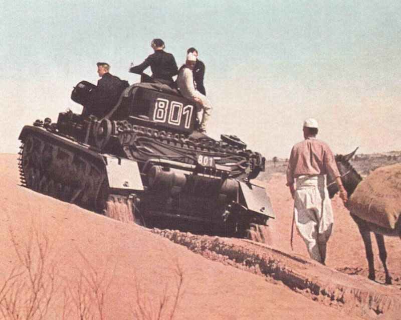 Diary April 15, 1941 10 Panzer IV of the Afrika Korps is climbing a sand dune