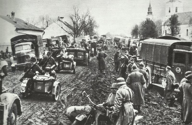 motorized German troops advance on worse roads