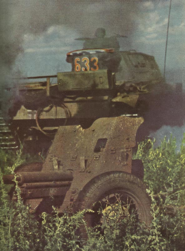 German tank has knocked-out and rolled over a Russian AT gun