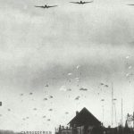 Paratroopers drop from Ju 52s