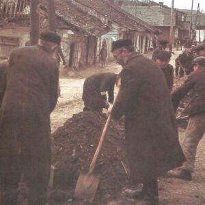 Jews forced to shovel coal.