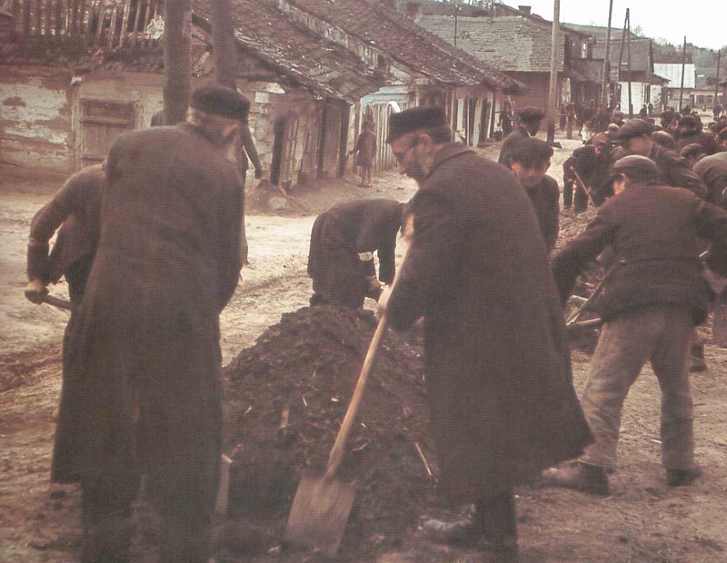 Jews forced to shovel coal.