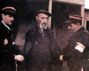 old Jew is arrested by two members of the Jewish ghetto police