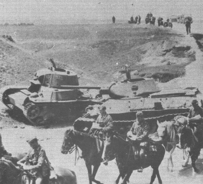 ussian OT-133 flame-tank lies abandoned next to a T-34 Model 1941