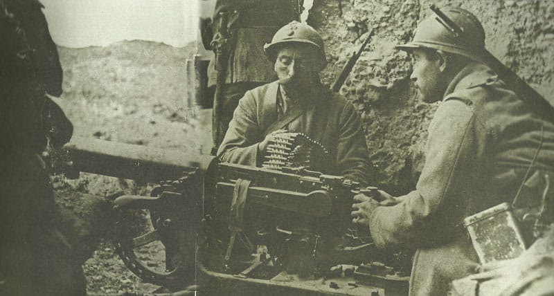 French soldiers man a German machine gun