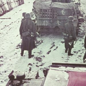 Column of German tanks with infantry in front of Moscow.