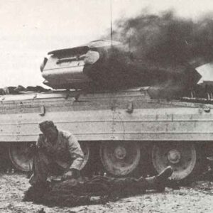 First aid to a crew member of a knocked-out British Crusader tank