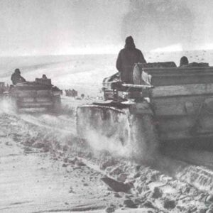 StuG assault guns on their way through snow fields