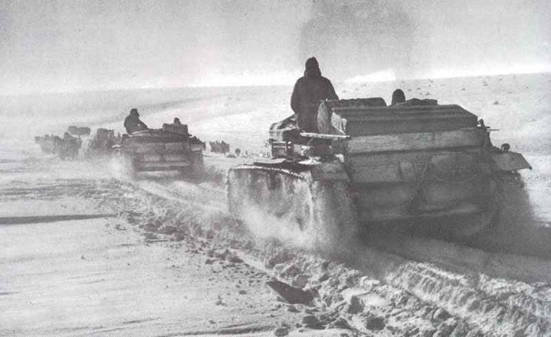 StuG assault guns on their way through snow fields