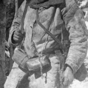 Rumanian soldier wearing ragged and improvised equipment