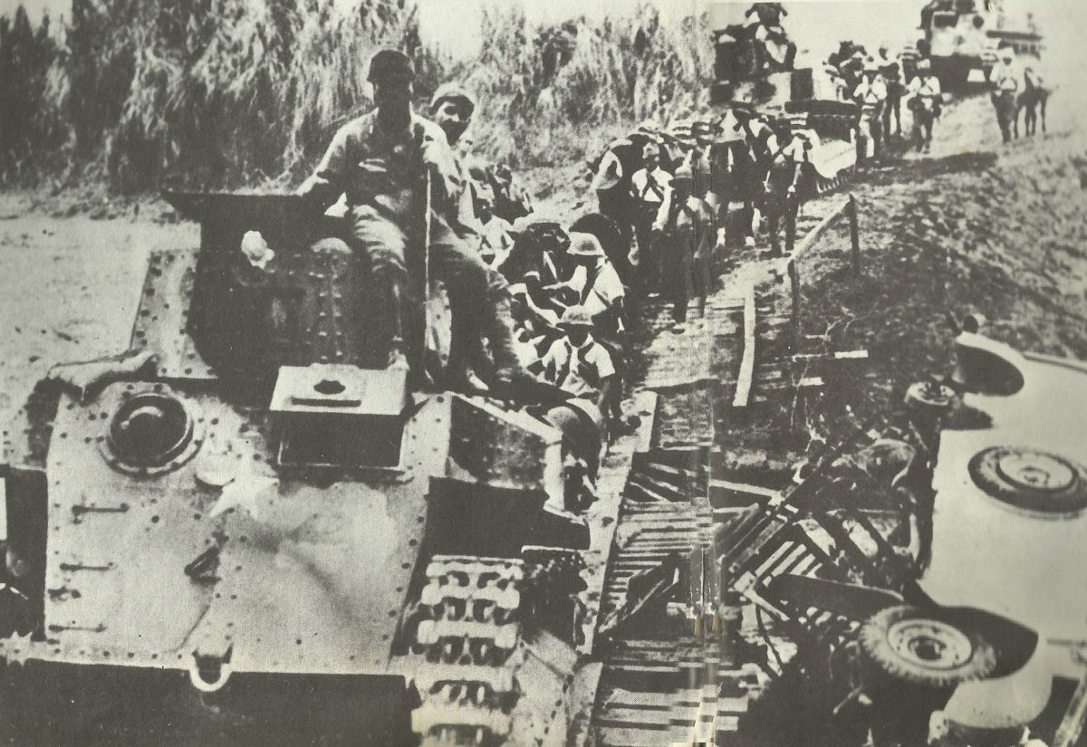Diary February 9, 1942 18 Japanese light tanks cross a provisional bridge