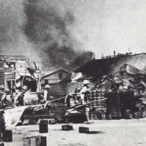 Japanese soldiers capture the railway station of Rangoon.