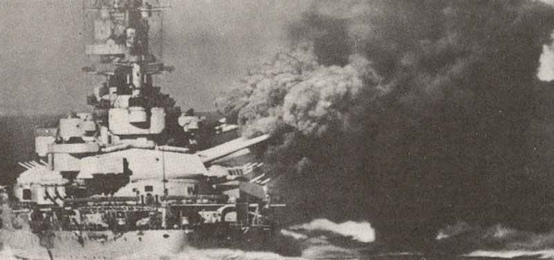 Italian battleship is firing her guns