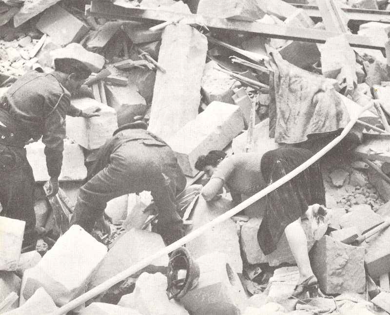 Air raid helpers searching for survivors Malta