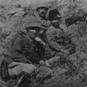 Turkish staff officer with a ten-year-old boy soldier