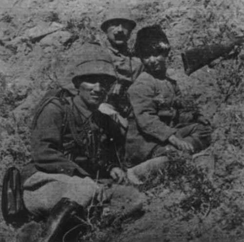 Turkish staff officer with a ten-year-old boy soldier