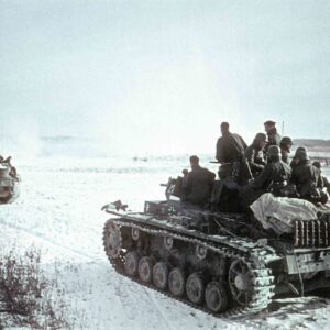 column of German Panzer III, crowded with infantrymen