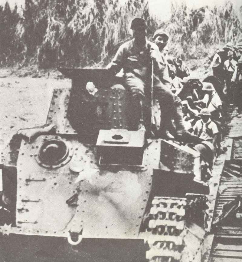 Japanese tanks crossing a auxiliary bridge in Burma.