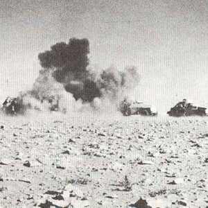 British armoured cars under bomb attack by Stukas.