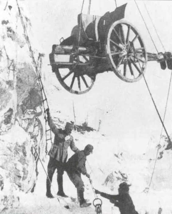 raising gun in the Alps