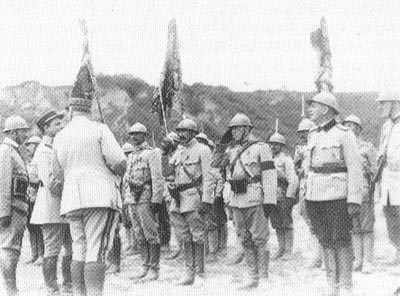 French officers awarding medals to Rumanian troops