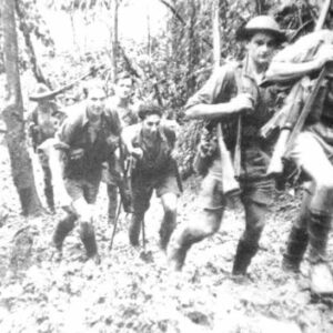 Australian soldiers of the 39th Battalion marching on the Kokoda Trail